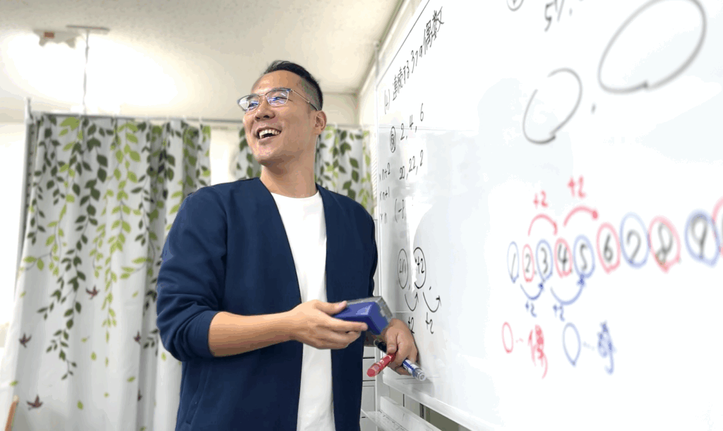 授業をする塾長